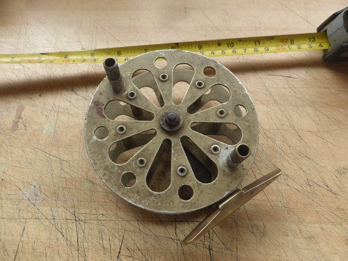 Old fishing reel made - old,