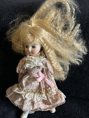 Porcelain doll called noel - porcelain,