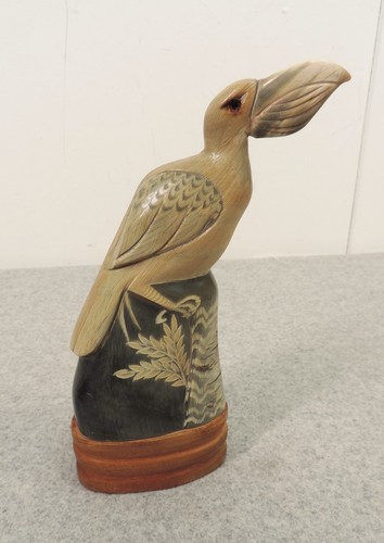 Hand carved buffalo - horn, bird