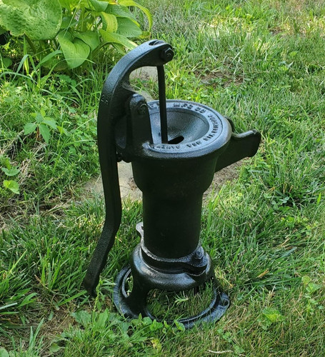 Antique cast iron well - antique,