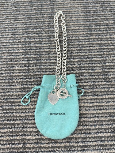 Authentic tiffany return - &,