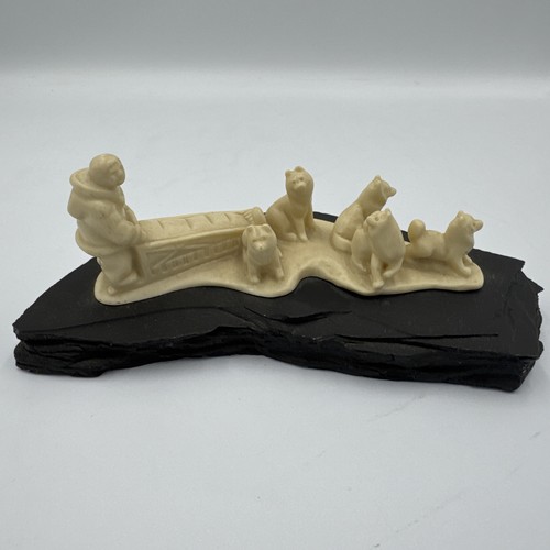 Pearlite carved dog sled - dog, on