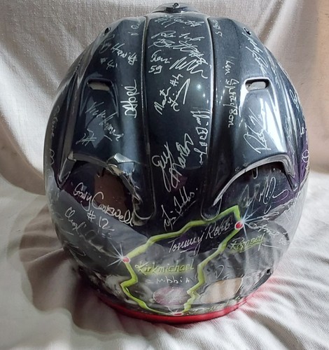 Multi signed helmet 36 - signed, by