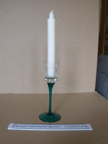 Tall glass candle holder with - candle,