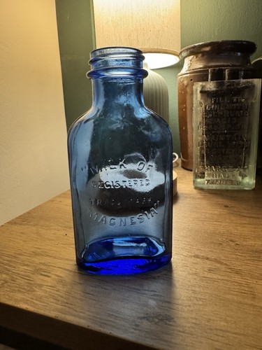 Vintage cobalt blue milk - cobalt, of