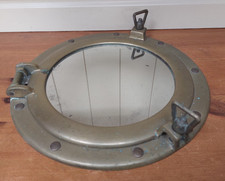 Vintage brass porthole mirror