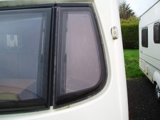 CARAVAN FRONT NEARSIDE WINDOW