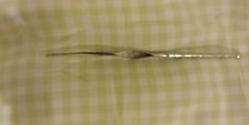 Vintage metal crochet hook 4 and half size . Made in England  good condition