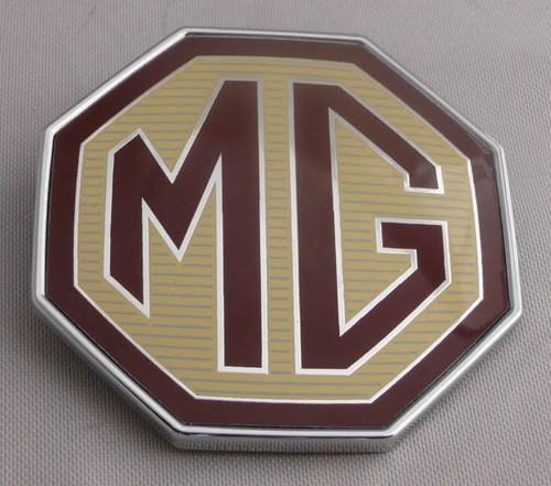 Front rear badge - front,