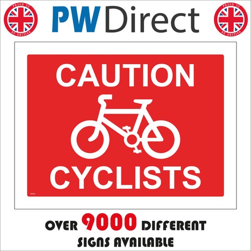 Sign caution cyclists bicycles - caution,