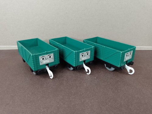 Three green troublesome trucks - three,