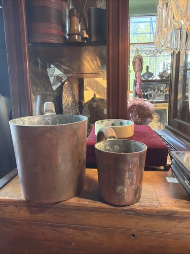 Two copper rum measures both - two,