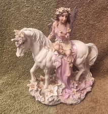 REGENCY FAIRY ON A UNICORN