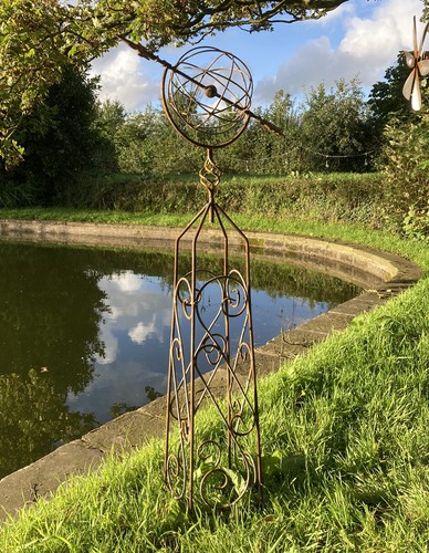 Rusty metal garden - metal, armillary