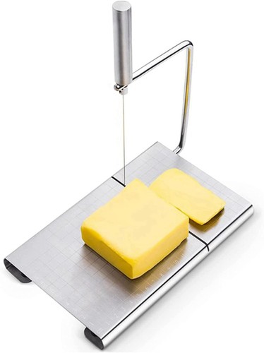 Cheese slicer board - cheese,