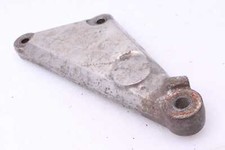 Footrest retaining plate rear