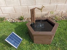 Pond including water feature