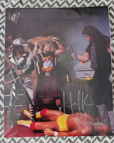 Signed magazine page macho man - magazine,