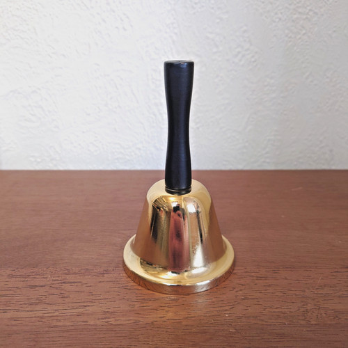 Metal hand bell - hand,