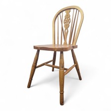 Wheel back pine chair -
