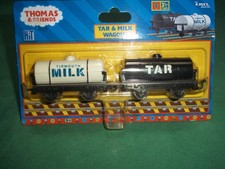 ERTL MILK AND TAR TANKERS IN UNOPENED ORIGINAL PACKAGING