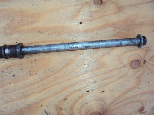 Honda front wheel spindle - honda,
