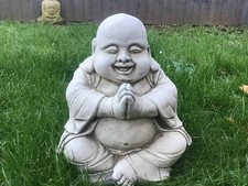 STONE GARDEN FAT HAPPY SMILING