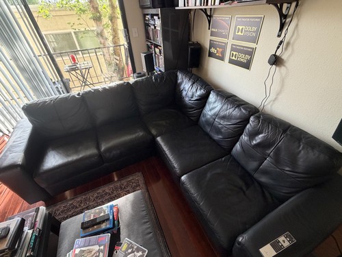 Black leather sofa used - black,