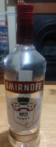Empty smirnoff 21 vodka - empty, no.