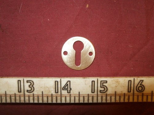 Vintage brass keyhole cover