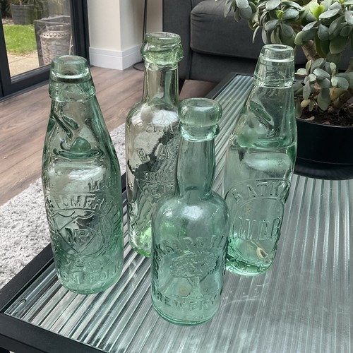 Vintage green glass bottles - green,