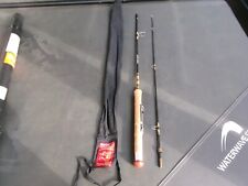 Pezon and Michel graphite or carbon throw fishing rod.