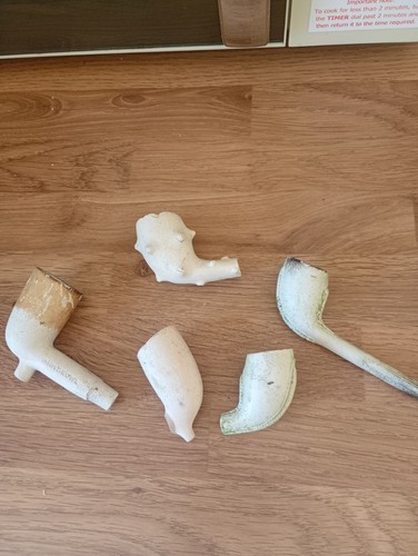 Five clay pipe bowls one - bowls,