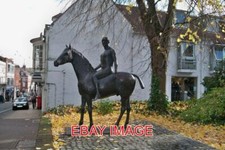 PHOTO  MAN ON A HORSE - WINCHESTER THIS BRONZE LIFE SIZE SCULPTURE IS ON THE HIG