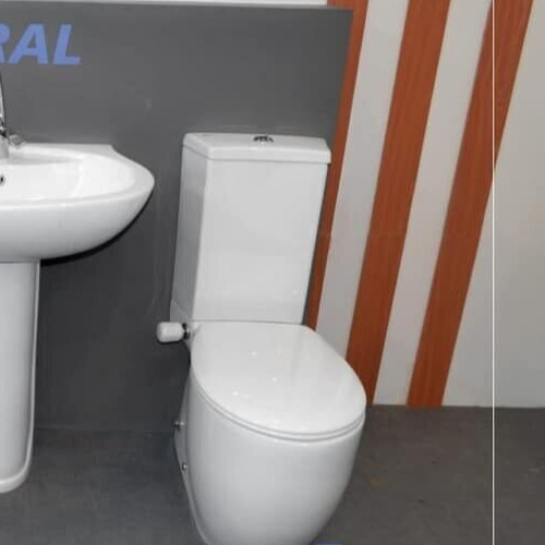 Close coupled toilet with - close,