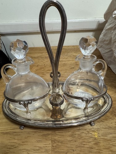 Silver cruet set featuring tow - silver,