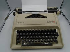 Vintage Olympia Carina 2
