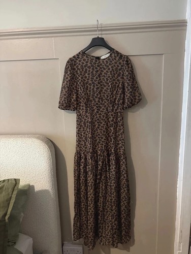 Never fully dressed leopard - never,
