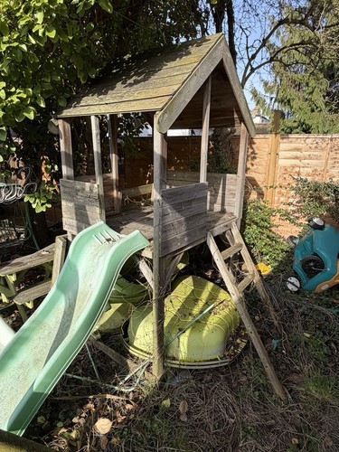 Wooden playhouse and slide - and,