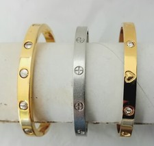 3 Oval Hinged Slave Bracelets