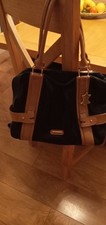 Oriano Women's Black and Tan Leather Handbag..Cracking on the underside handles