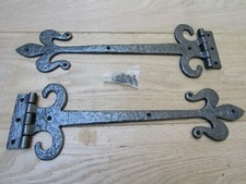 PAIR OF ANTIQUE IRON 18" FLEUR