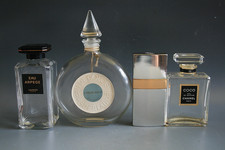 FOUR VINTAGE GLASS SCENT BOTTLES - CHANEL , LANVIN AND GUERLAIN