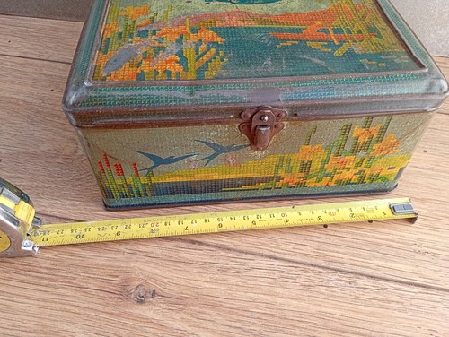 Vintage blue bird toffee tin