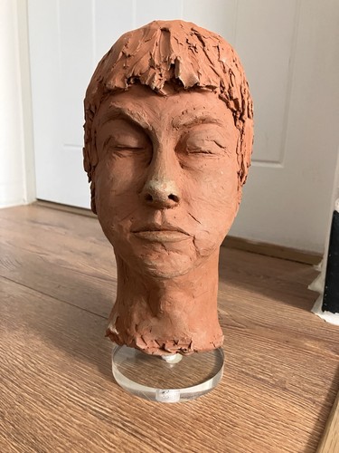 Terracotta clay face - terracotta,