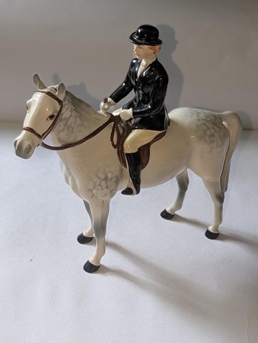 Beswick horse huntswoman on - -,