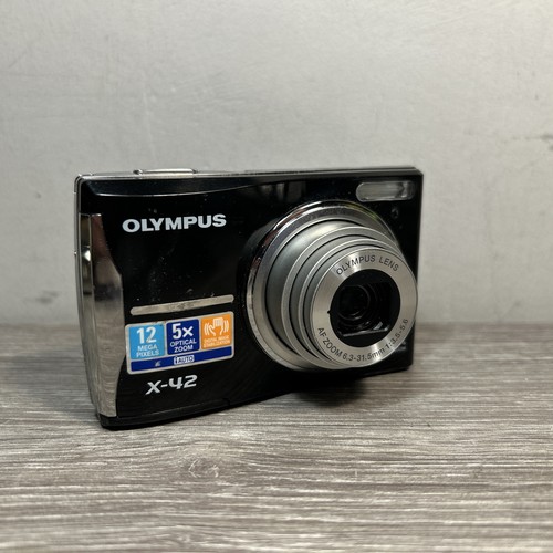 Olympus compact digital - x-42,