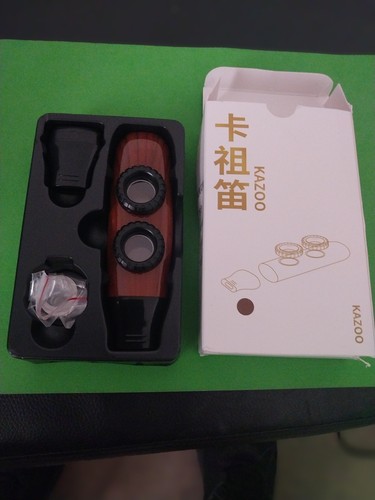 Kazoo with extra membranes - with,