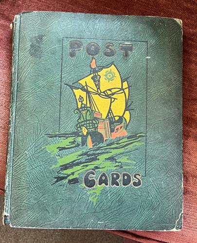 Empty antique postcard album