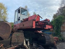 Poclain 125 excavator breaking